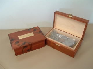 Wooden pet urns on a table